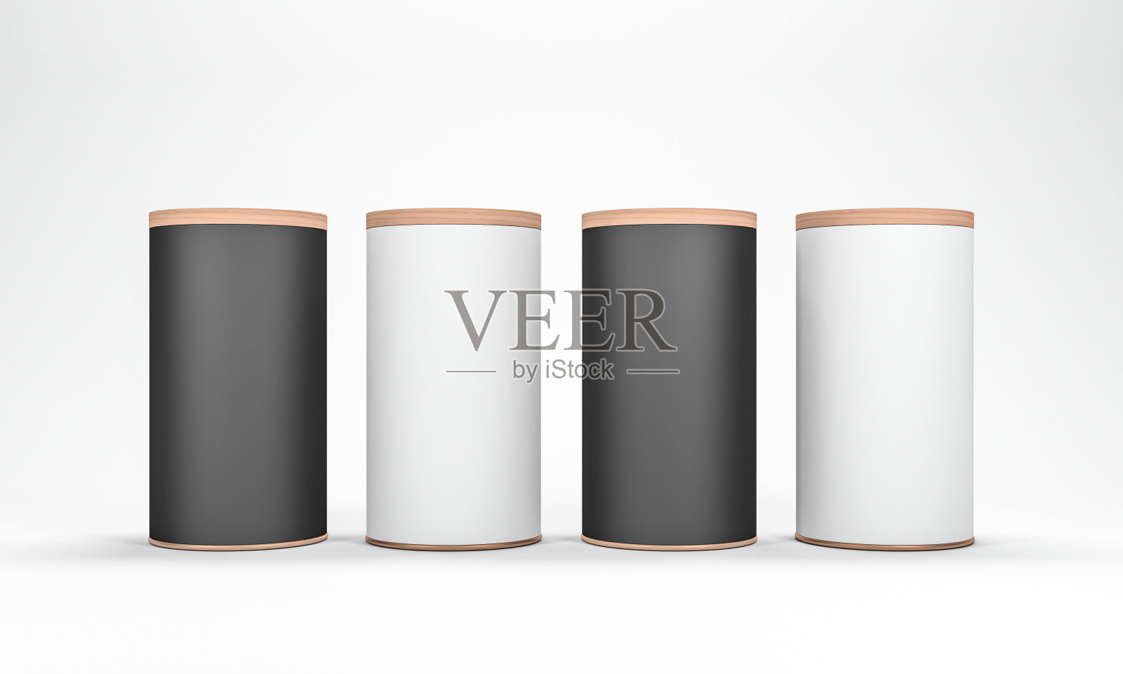 四罐罐头模型与木制盖子。黑白圆柱包装照片摄影图片