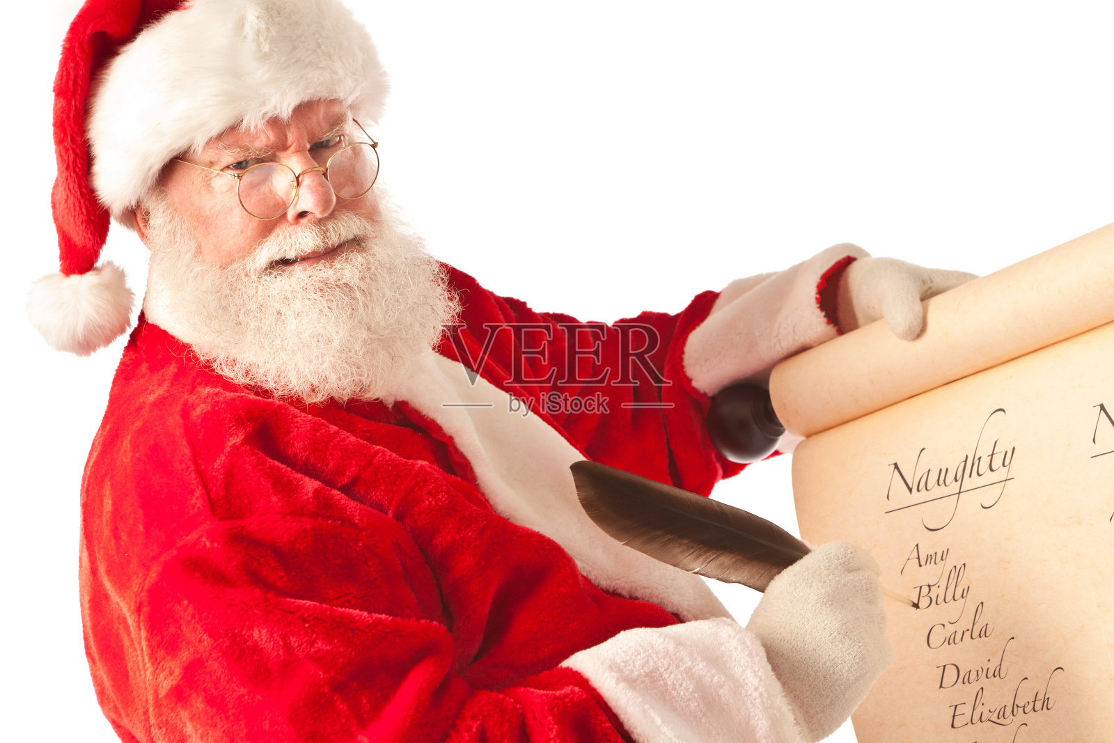 圣诞老人与圣诞名单的名字在白色的背景照片摄影图片