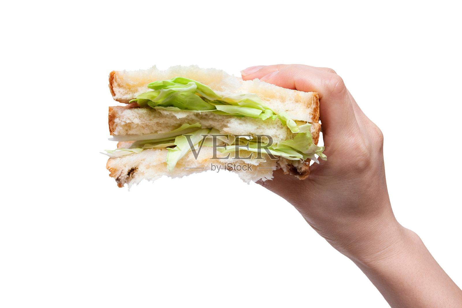 拿着一个孤立在白色背景上的蔬菜三明治照片摄影图片