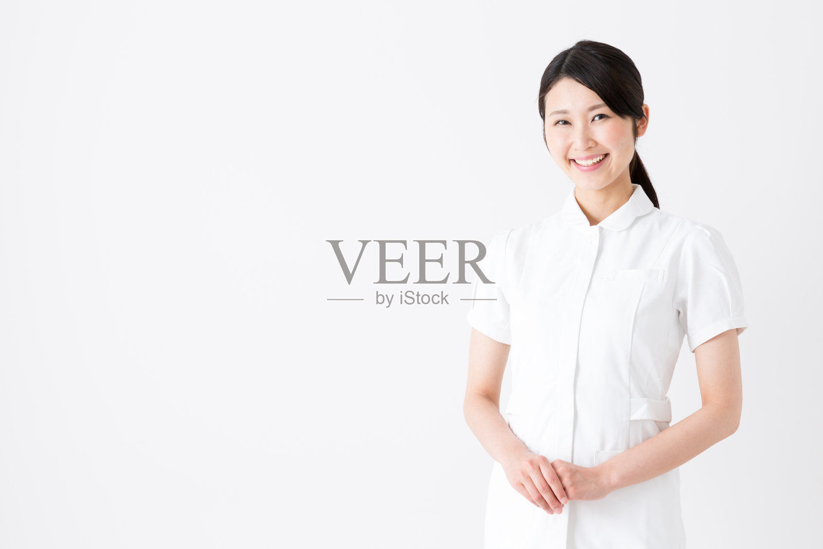 年轻亚洲护士的肖像孤立在白色背景照片摄影图片