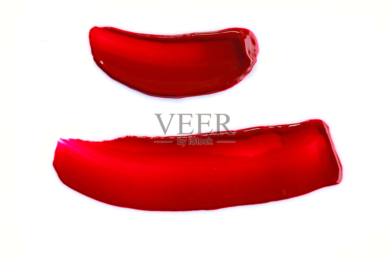 液体红色唇膏的质地为嘴唇孤立的白色背景照片摄影图片
