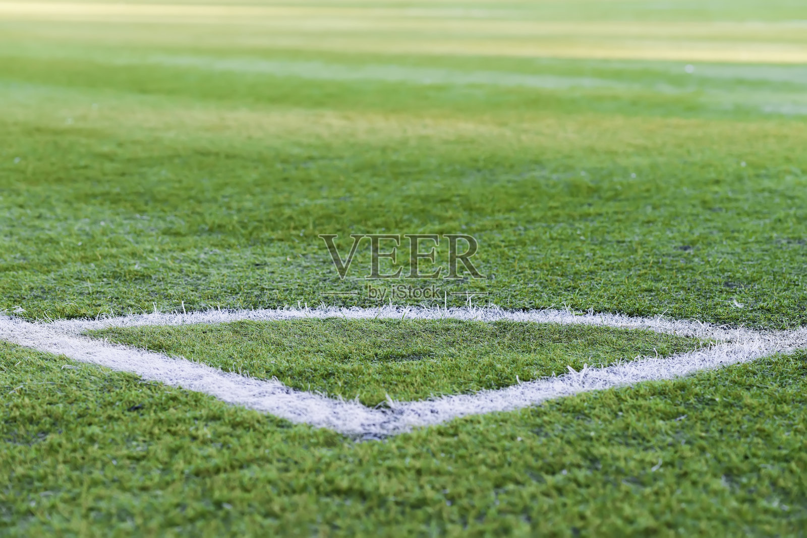 足球场地的一角，足球运动的绿草图案，足球运动的纹理，选择性的焦点插画图片素材