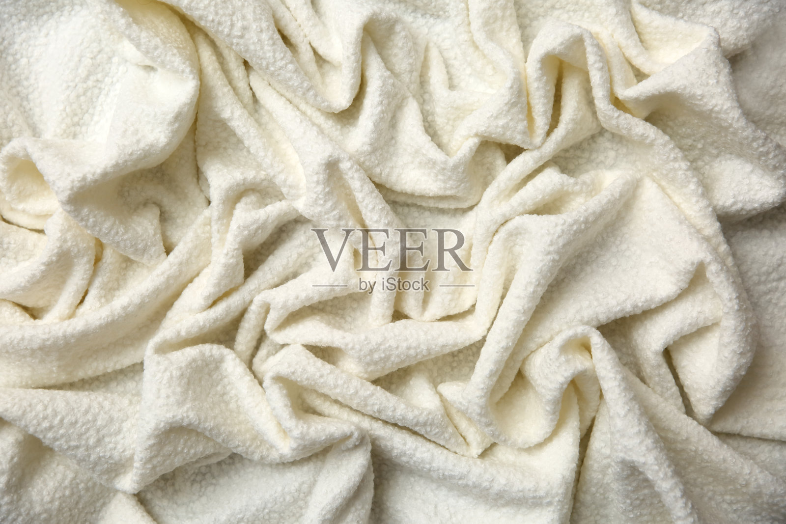 棉质毯子，质地有趣，皱褶很不规律，很有艺术感。照片摄影图片
