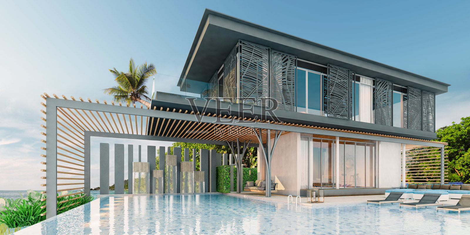 海景游泳池在现代阁楼设计，豪华的海洋海滩房子照片摄影图片