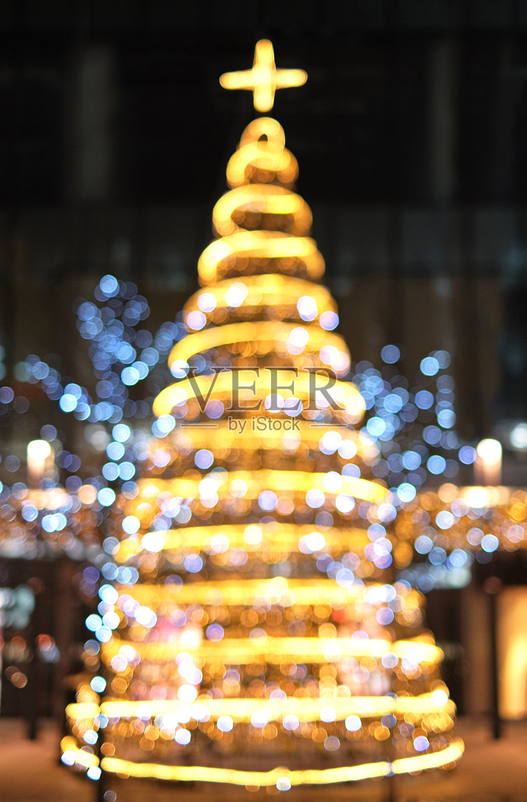 圣诞装饰背景用金色和蓝色的彩灯发光照片摄影图片