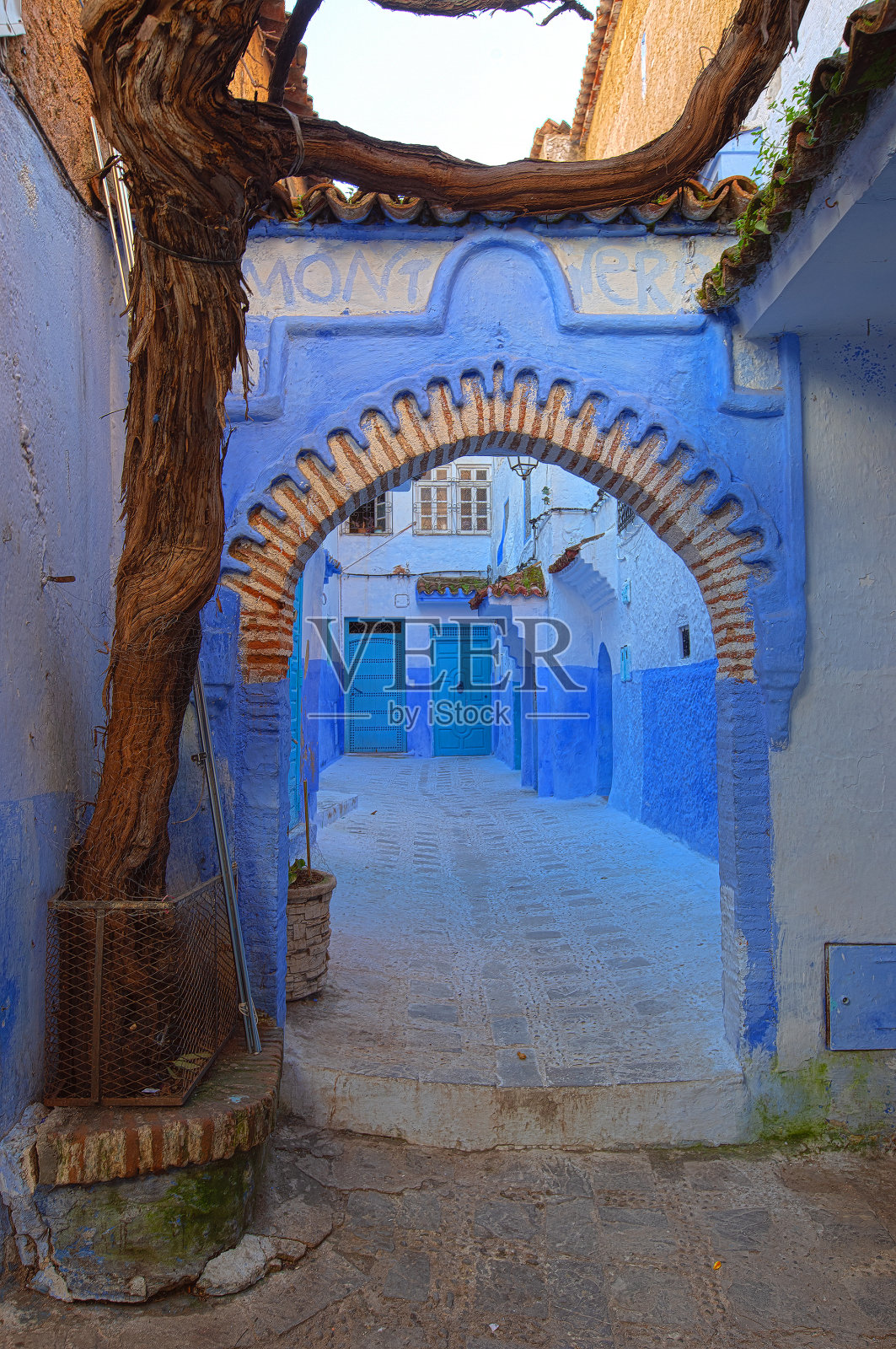 蓝色城市舍夫chaouen的拱门和门照片摄影图片