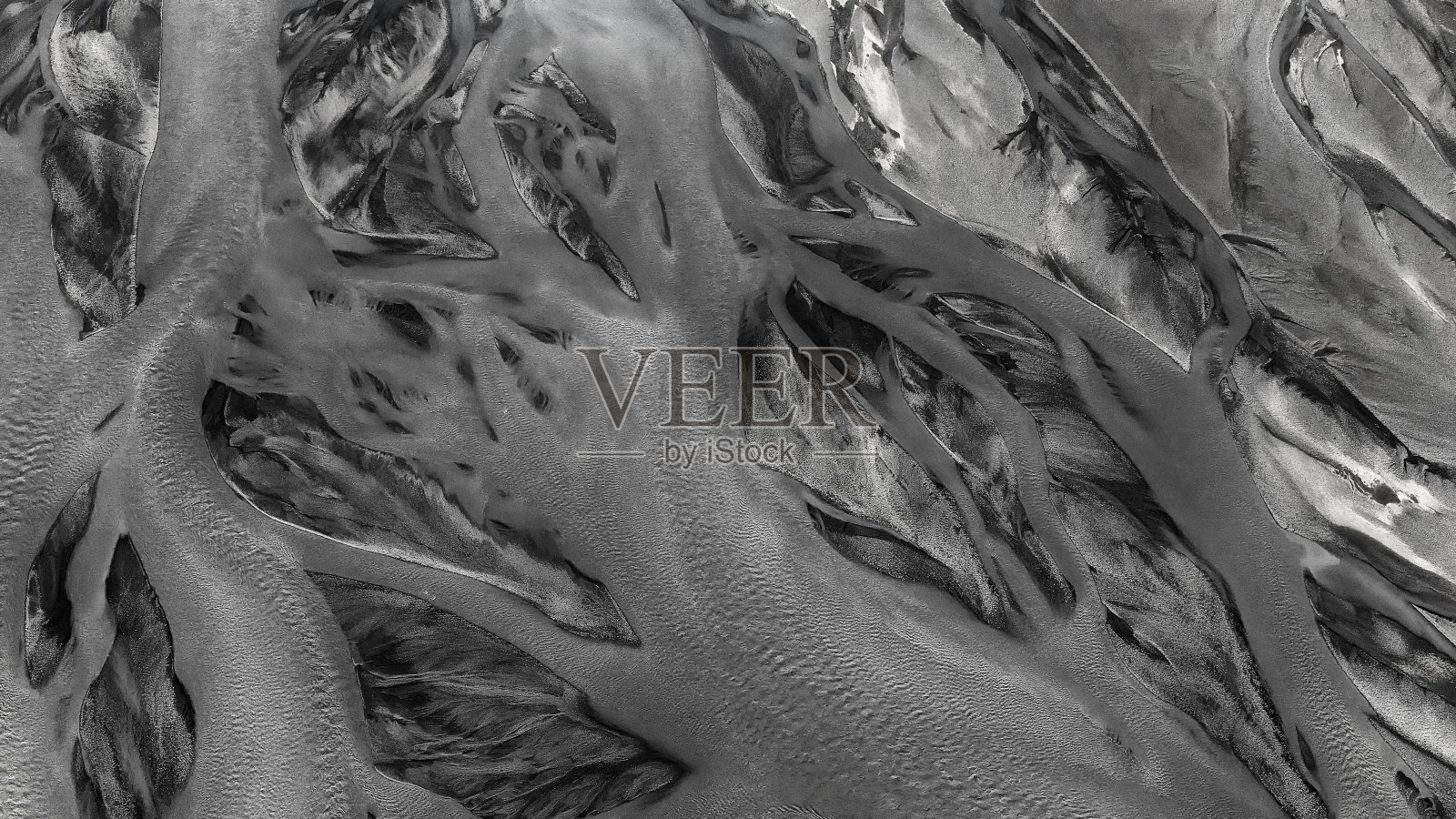 鸟瞰图和直接俯瞰冰岛的一个河流三角洲的格局照片摄影图片