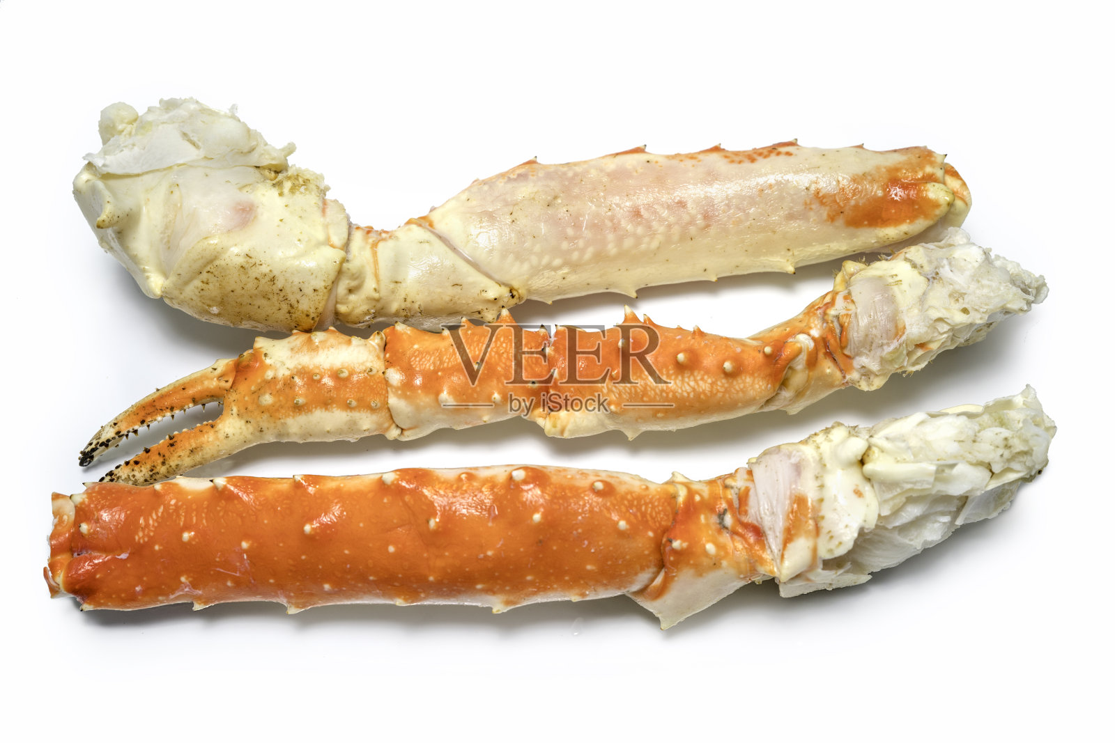 阿拉斯加帝王蟹腿孤立在白色背景，堪察加蟹孤立在白色背景照片摄影图片