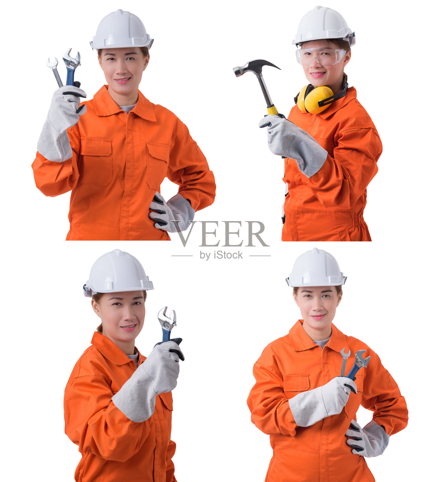 一组穿着机械师连体衣的女工人正在白色背景上拿着一个孤立的工具照片摄影图片