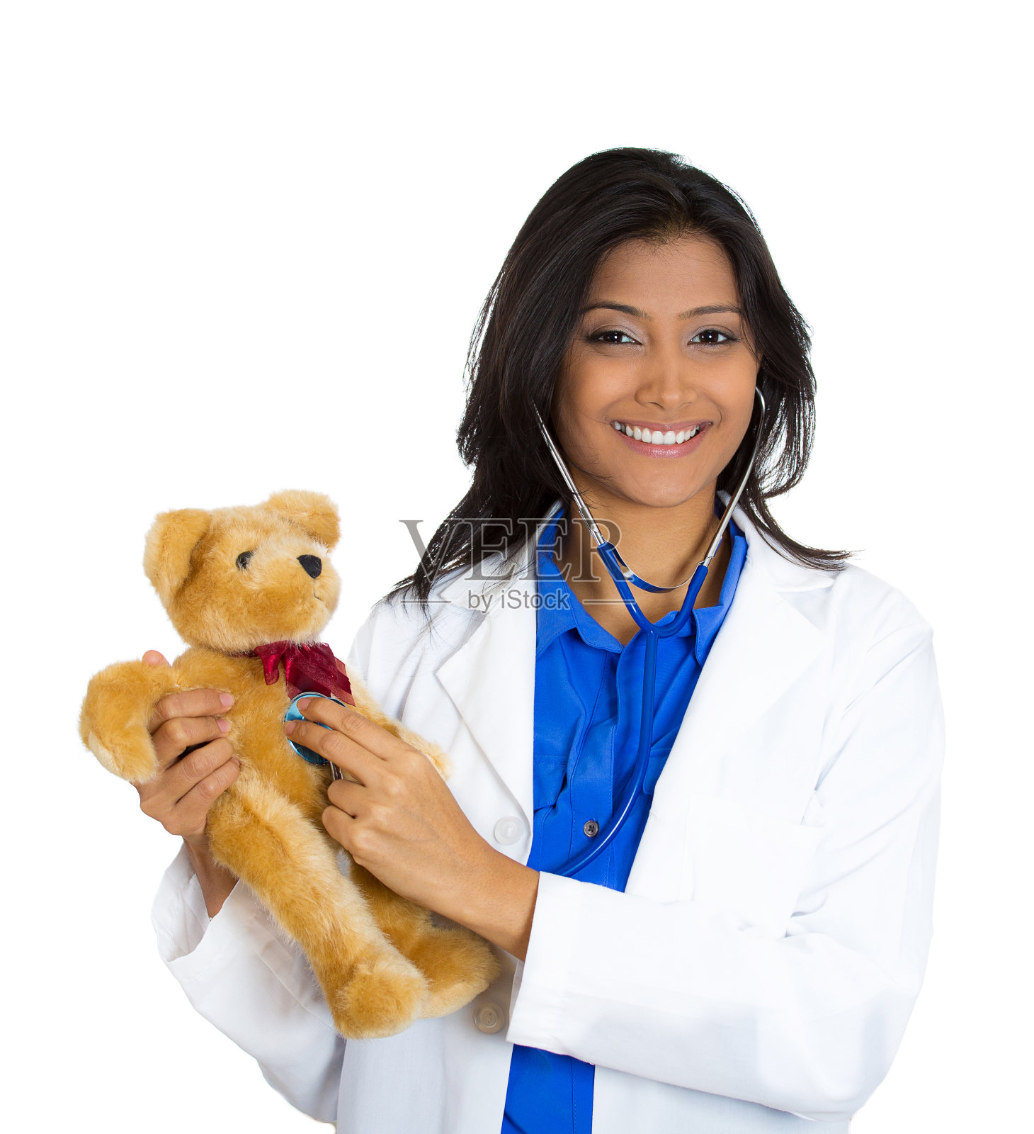 友善微笑自信的女医生抱着泰迪熊的肖像照片摄影图片