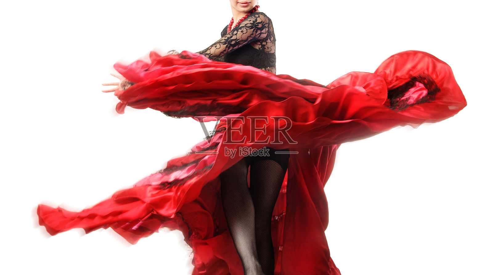 优雅的弗拉明戈舞者与裙子的运动照片摄影图片