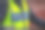 瑞典警察的特写穿着一个明亮的黄色绿色背心与警察文本。素材图片