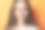 美丽的黑发女子肖像在橙色工作室素材图片