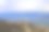 比格尔海峡，海鸟岛殖民地——远处白雪覆盖的乌斯怀亚素材图片